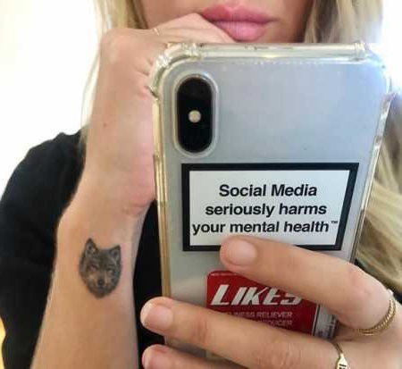 Lisa Clark Tattoo and phone
